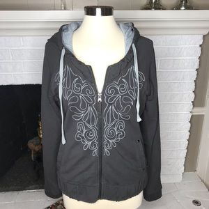Lucy front zip hoodie with design. Size Medium.